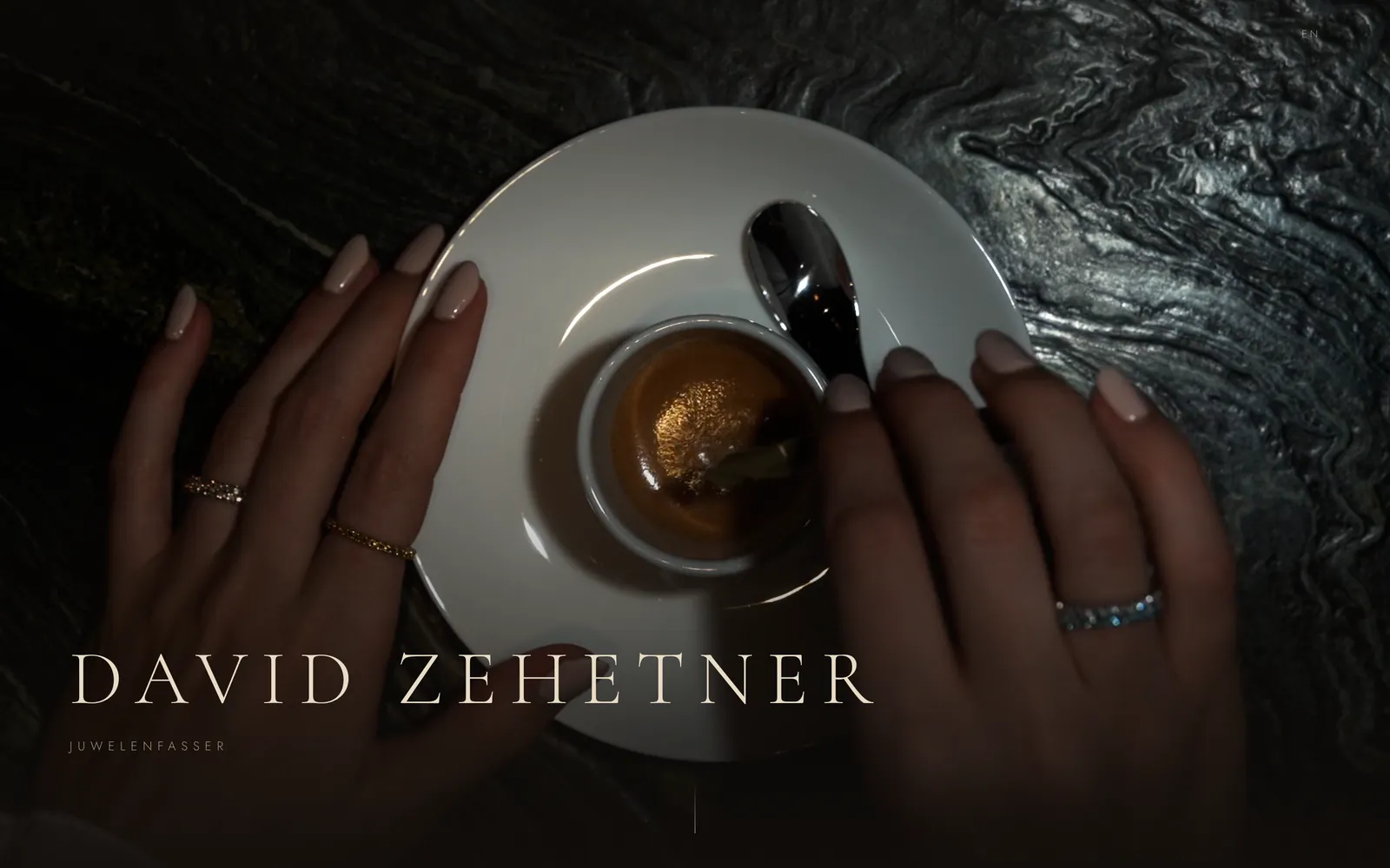 David Zehetner website hero with hands, rings and an espresso cup